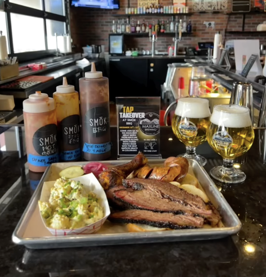 Fort Collins Brewery Tap Takeover at Smok BBQ. Local business collaboration displayed with maxline beers on tap at smok, with a full plate of bbq foods.